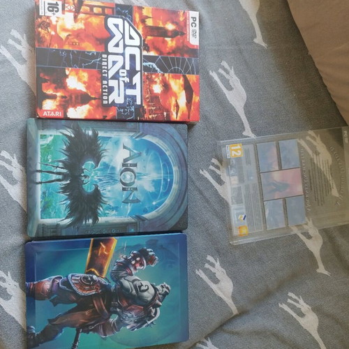 Games with steelbooks like new, Aion, WildStar, Act of War