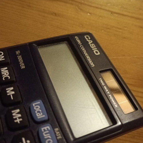 Casio calculator used, solar powered with minor screen damage