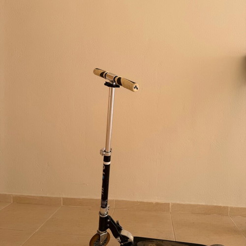 Micro scooter used, heavy-duty metal with stand
