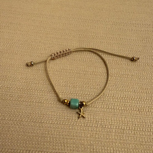 Bracelet with bead and stars lightly used, turquoise