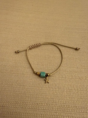 Bracelet with bead and stars lightly used, turquoise