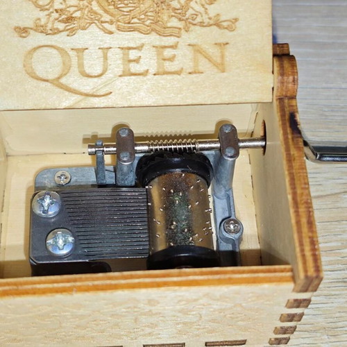 Wooden Queen Music Box like new with hand crank and engraved design
