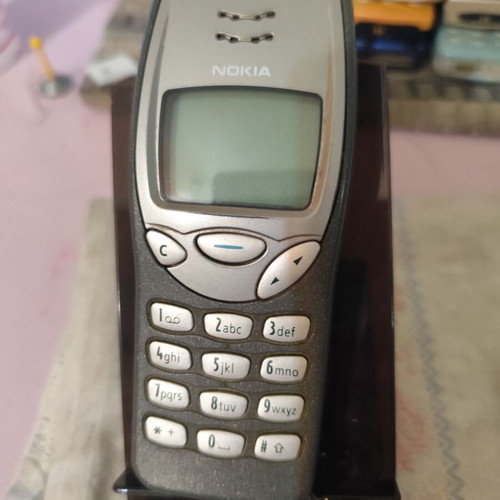 Nokia 3210 vintage cell phone used with new battery and front cover