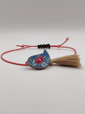 Martis bracelet with wooden blue bird and tassel new