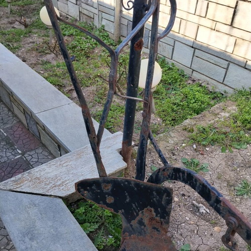 Yni used, old-style soil cultivator for garden decoration