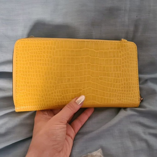 Yellow wallet used with strap