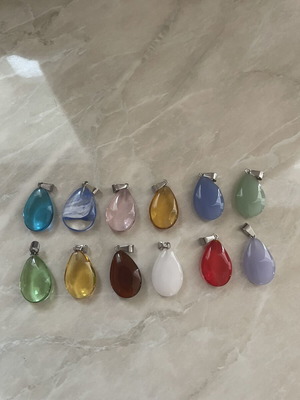 Pendant drops like new with two gift straps
