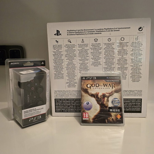 PlayStation 3 Super Slim console, sealed with DualShock 3 controller, God of War Ascension
