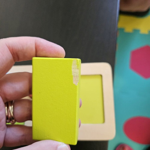 Hape shape puzzle used with marks from small hands