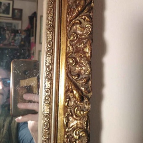 Antique mirror used with carved frame in gold crackle finish