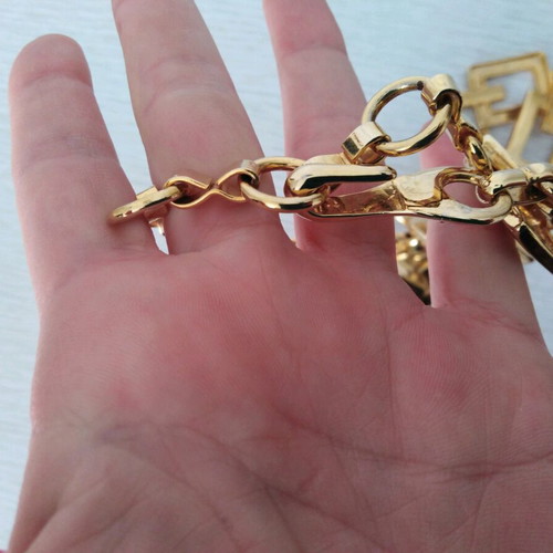 Metallic gold-plated belt with geometric design like new, 105 cm