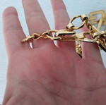 Metallic gold-plated belt with geometric design like new, 105 cm