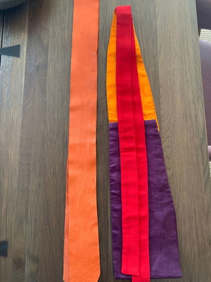 Handmade designer belts used, multicolor satin and orange leather