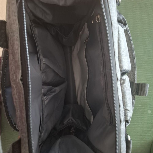 Baby backpack like new with multiple compartments and three insulated bottle holders