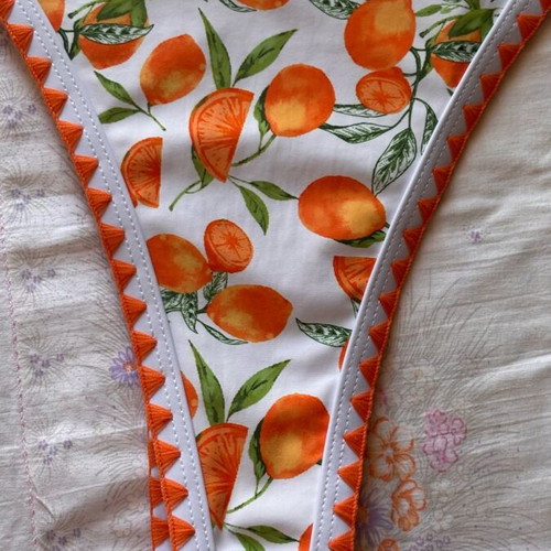 Women's swimsuit like new, white and orange with orange print, size M