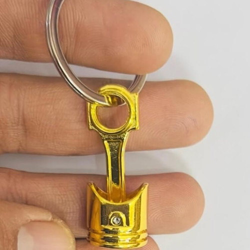 Car piston keychain, gold color