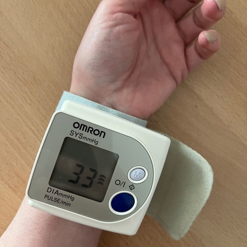 Omron digital wrist blood pressure monitor used