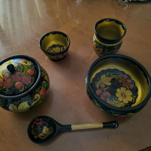 Vintage Russian-style wooden utensils and spoon hand-painted
