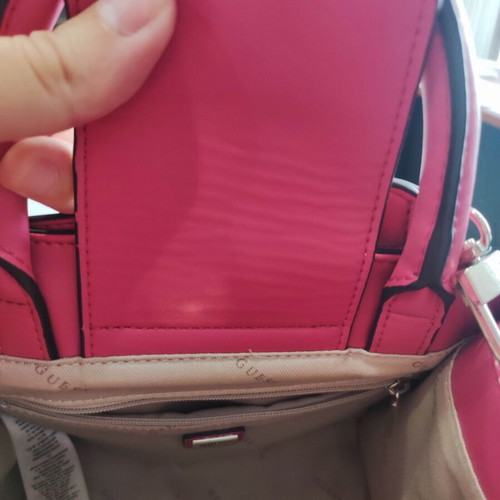 Guess handbag like new, fuchsia color with extra strap