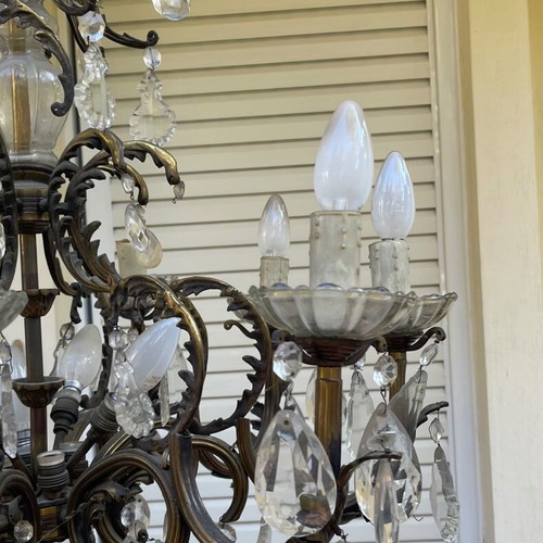Antique chandelier used with bronze and crystal