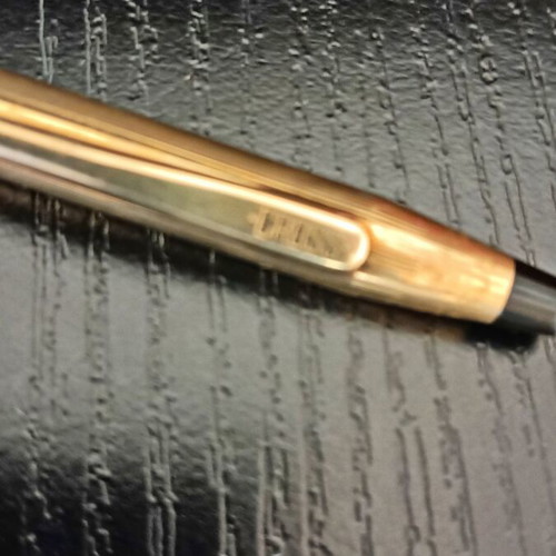 Cross gold pen used