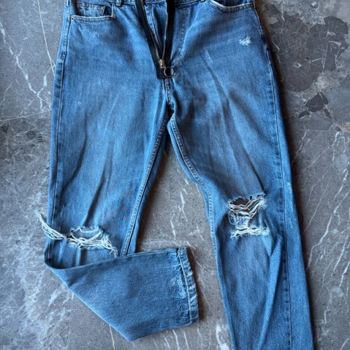 Women's blue jeans with rips and unique zipper like new