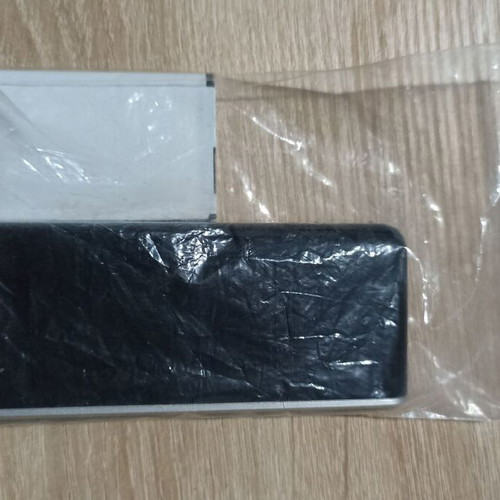 Alcatel cell phone new, black with buttons and accessories