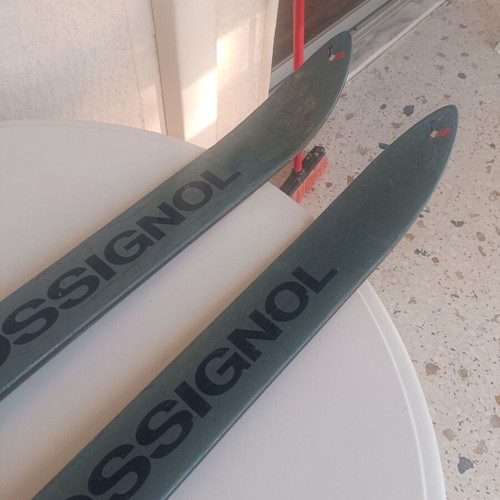Rossignol STS Fibroplastic skis used with Tyrolia 260 bindings, Skitique poles, and Solomon SX81 325 boots