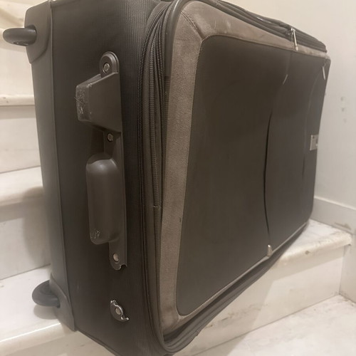 Delsey large travel suitcase like new, fabric with velour details