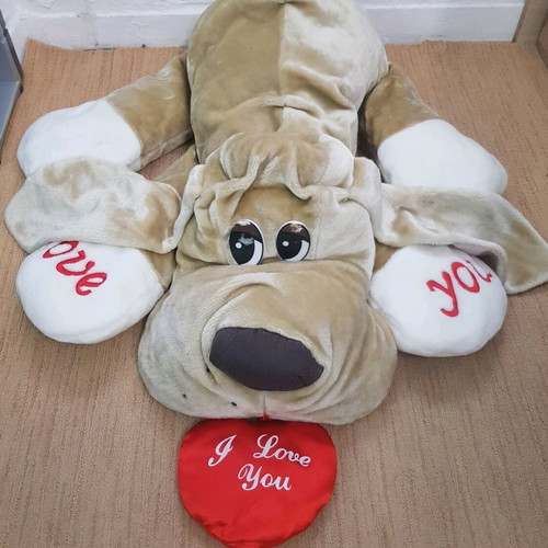 Large stuffed bear dog used