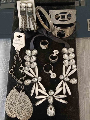 Set of 10 accessories: bracelets, rings, necklace, earrings