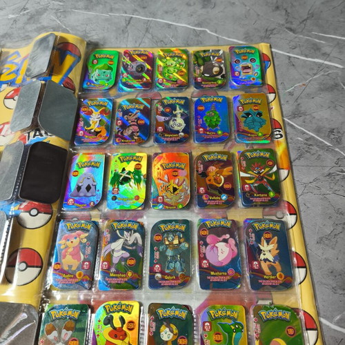 Pokemon collectible metal tags used