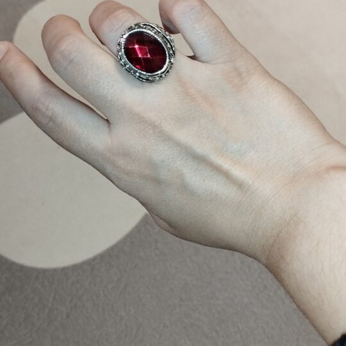 Statement cocktail ring with large red stone and rhinestones
