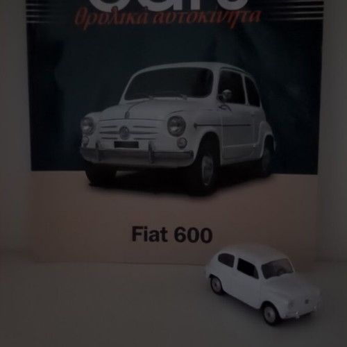 Fiat 600 collectible model car with booklet like new