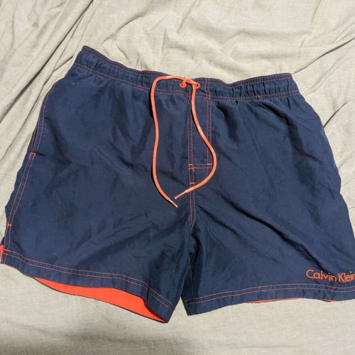 Calvin Klein men's swim shorts like new, blue with orange details, size L