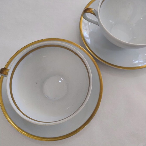 Porcelain tea cup set used, two cups with saucers