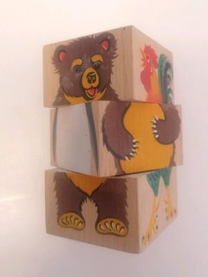 Wooden baby toy used with middle rotation feature