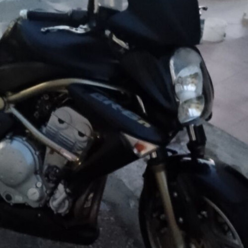 Kawasaki ER6 650cc motorcycle, 66000km, leather accessories