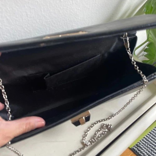 Clutch bag like new, black with chain strap for shoulder or hand