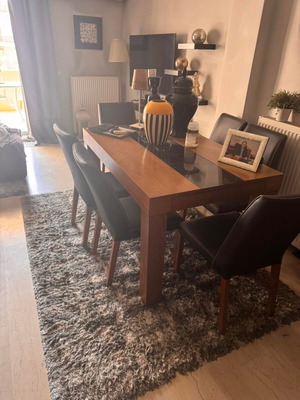 Dining table with 6 chairs like new, wood and glass design