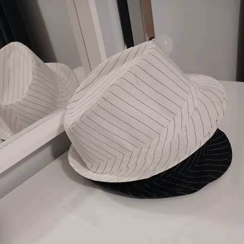 Hats like new, black and white, one size