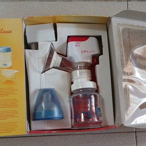 Chicco baby carrier and Nuk breast pump used
