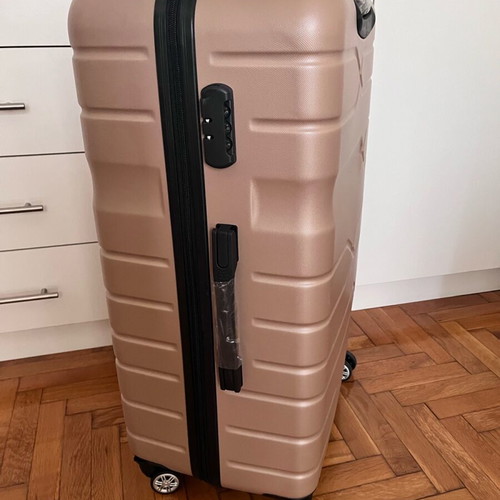 Suitcase new, unused, salmon color with lock and wheels