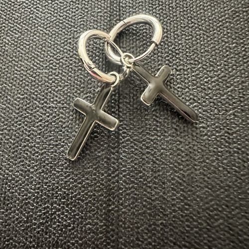 Silver steel huggie earrings with black cross