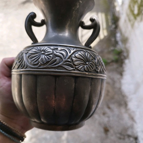 Vintage amphora used with embossed flowers and carved handles