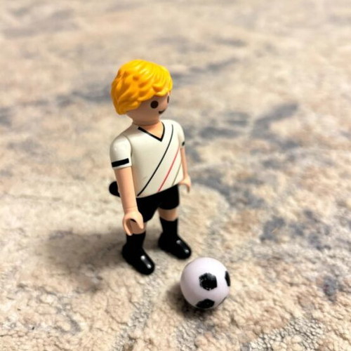 Playmobil footballer like new with faded ball