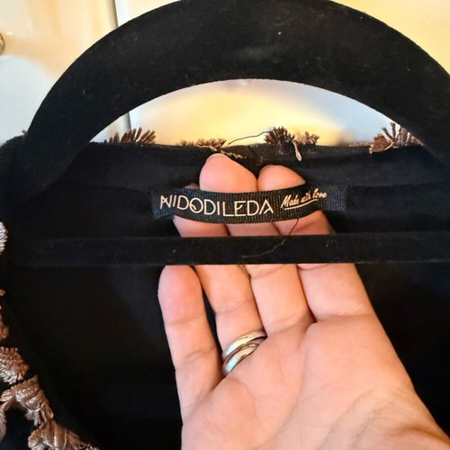 Nidodileda jacket like new, black with gold