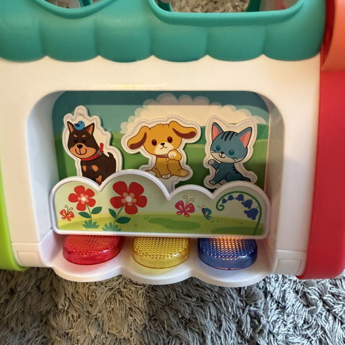 Baby toys set like new with shape matching eggs, house, and rattle gift