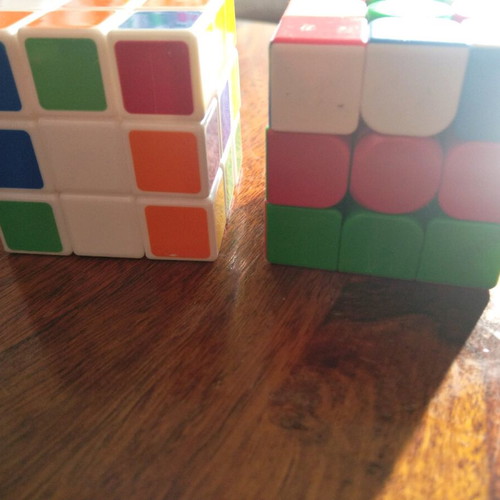 Rubik cubes used, pack of two with minor scratches
