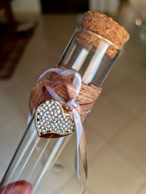 Test tube like new with heart charm